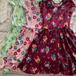 Lot of three DotDotSmile dresses Size 7. Includes Rare castle dress